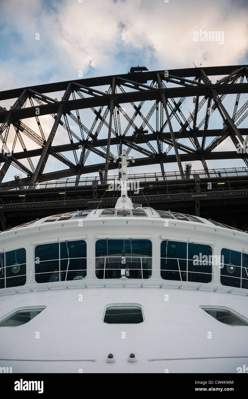 Luxury Cruise Liner Passing under the Sydney Harbour Bridge, Australia Stock Photo