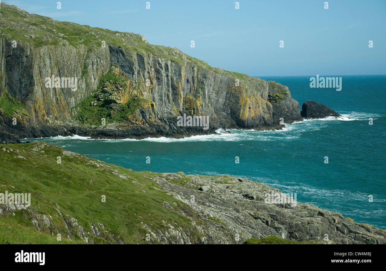 Cliffs frame turquoise sea on Baltimore's coast in County Cork, Ireland Stock Photo