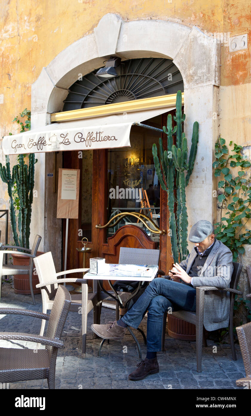 man sitting in cafe, Rome, Italy Stock Photo
