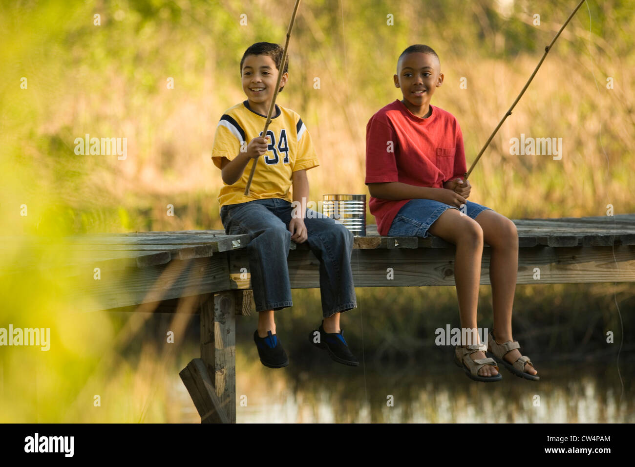 Two boys lake fishing hi-res stock photography and images - Alamy
