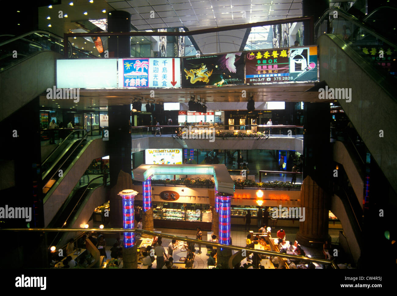 Escalator shopping mall in hong hi-res stock photography and images - Alamy