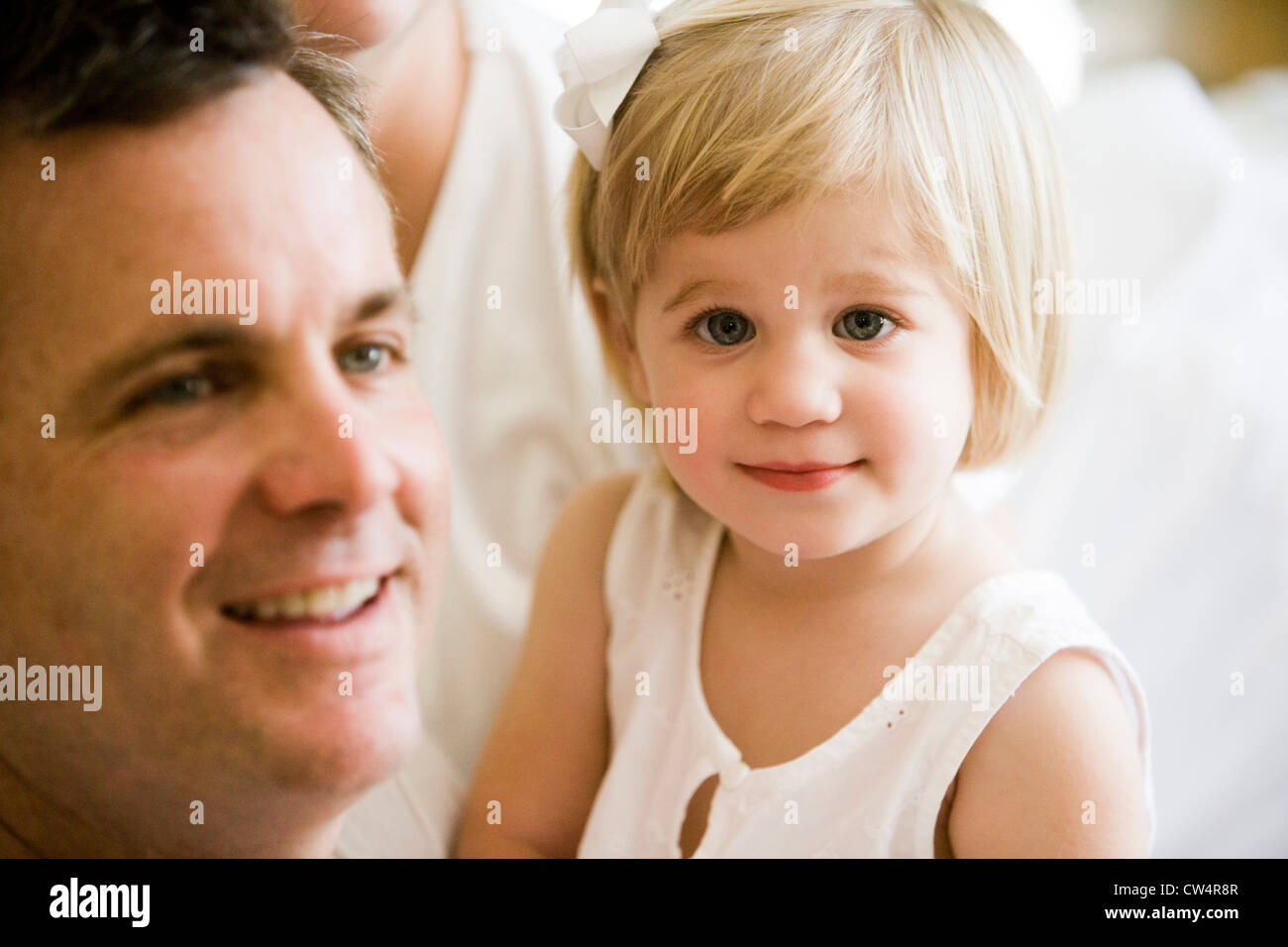 Portrait of a cheerful girl with her father Stock Photo - Alamy