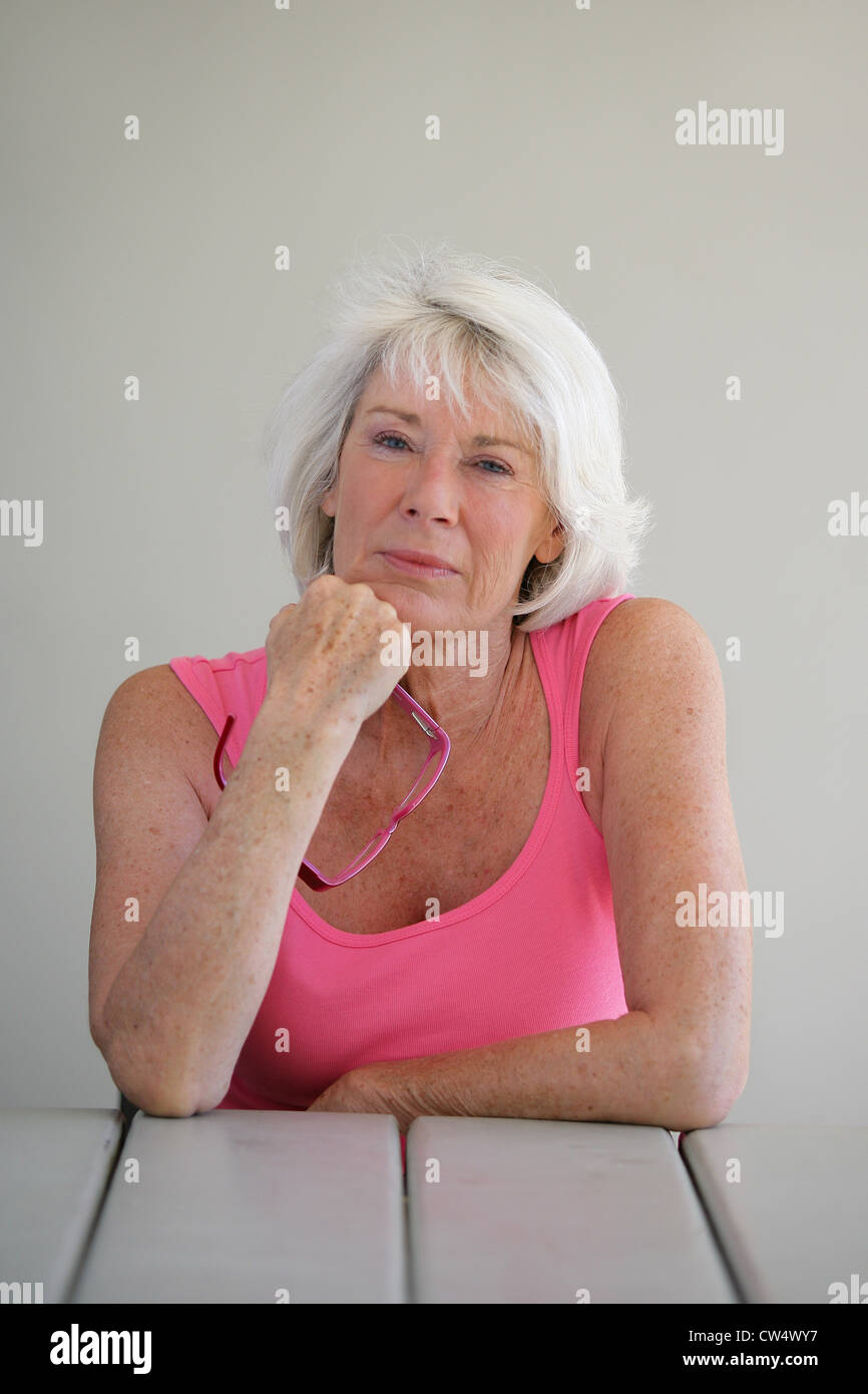 Serious older woman Stock Photo