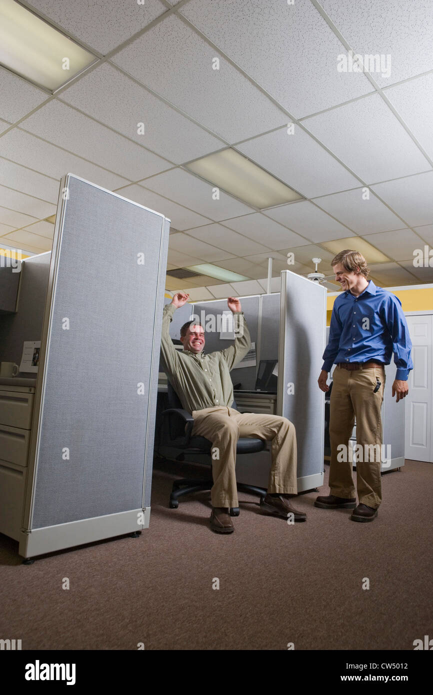 Portrait of businessmen smiling in an office Stock Photo - Alamy