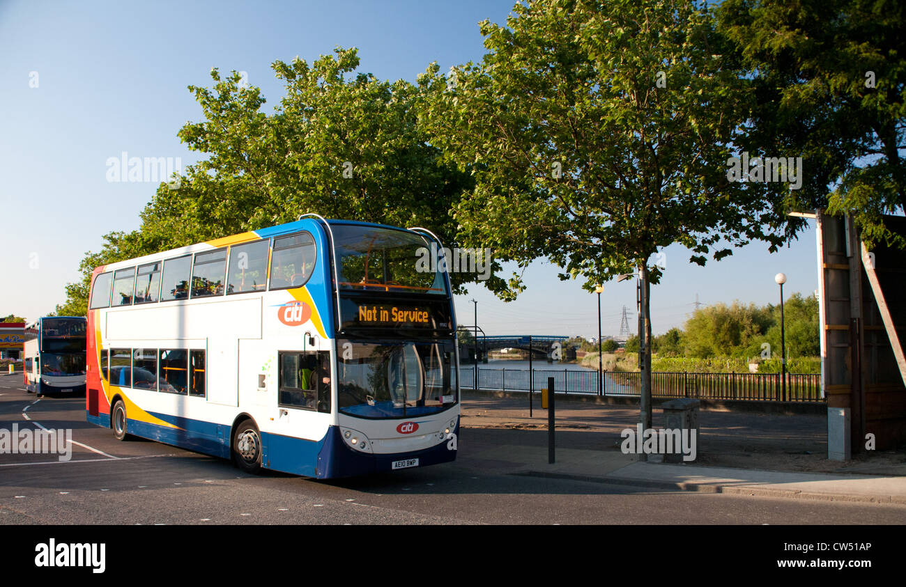 Official London 2012 Olympics buses en route to the Olympic venue in Excel, London, England, United Kingdom Stock Photo