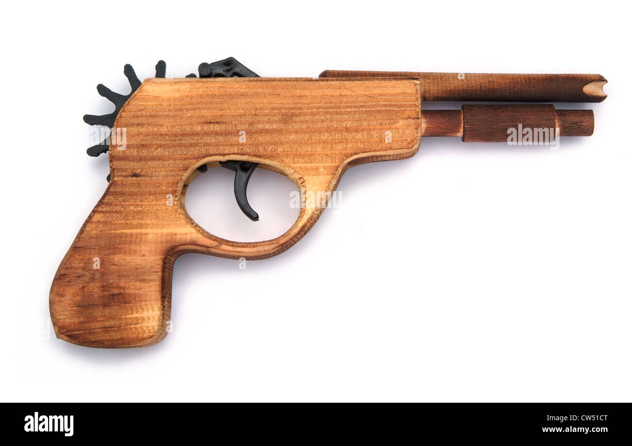Toy wooden gun for child , on a white background Stock Photo - Alamy