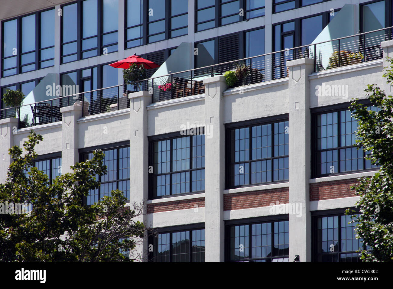 Milwaukee Downtown Condo patio with a red umbrella Stock Photo Alamy