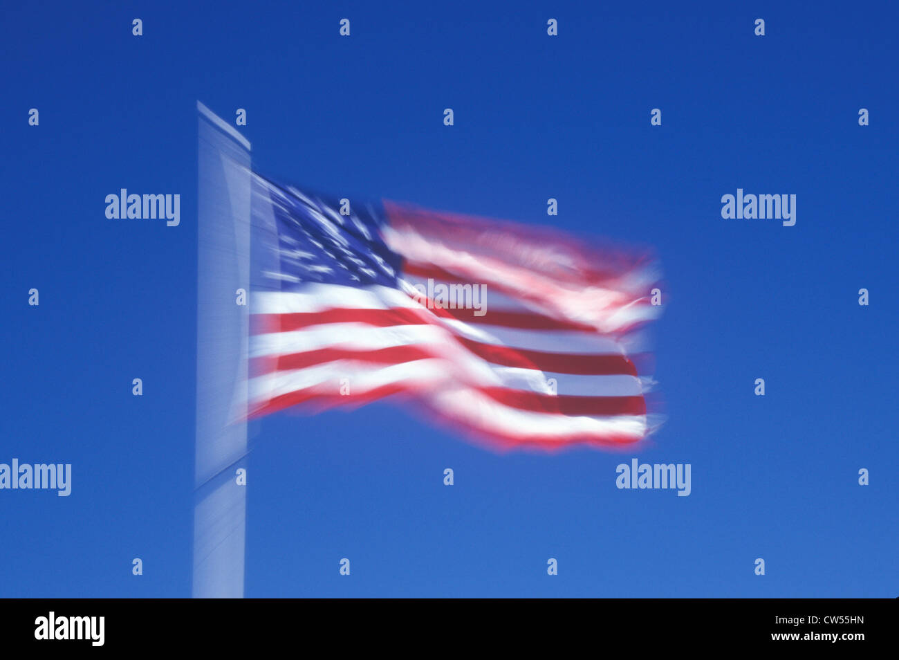 Blurry American Flag Against Blue Sky, United States Stock Photo - Alamy