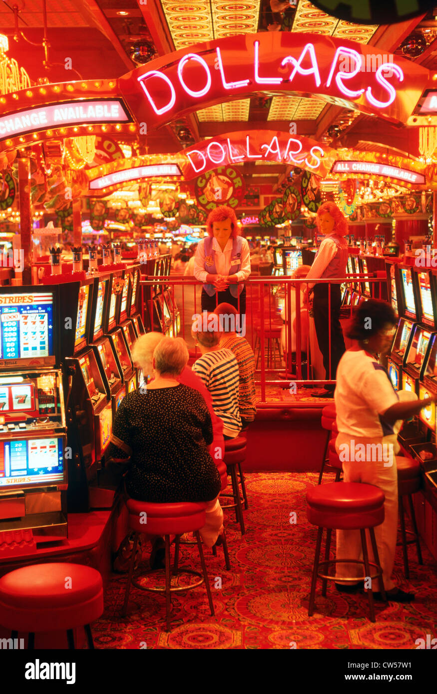 Dollars illuminated in neon lights on casino floor Stock Photo