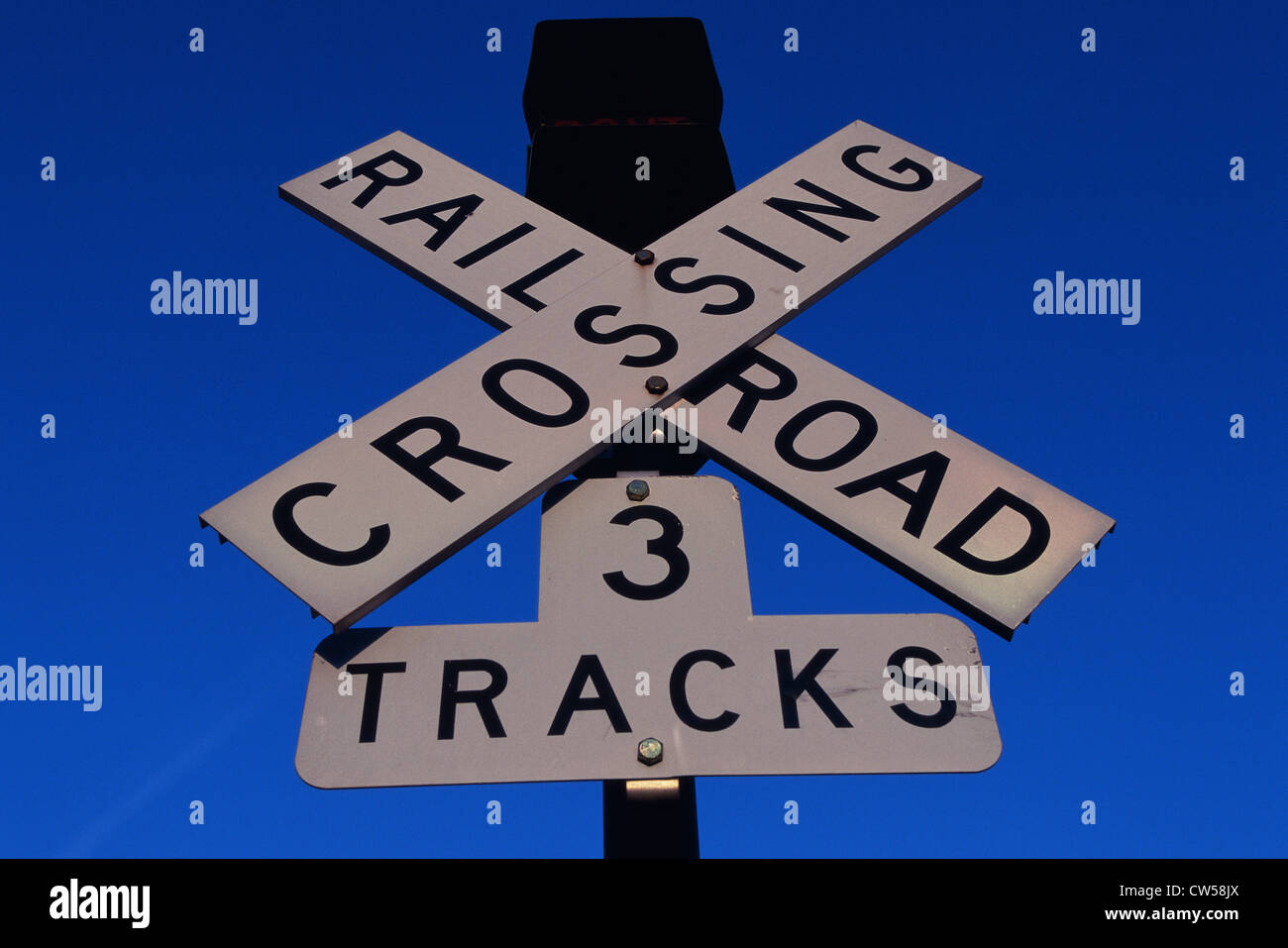 Low angle view of a railroad crossing sign Stock Photo