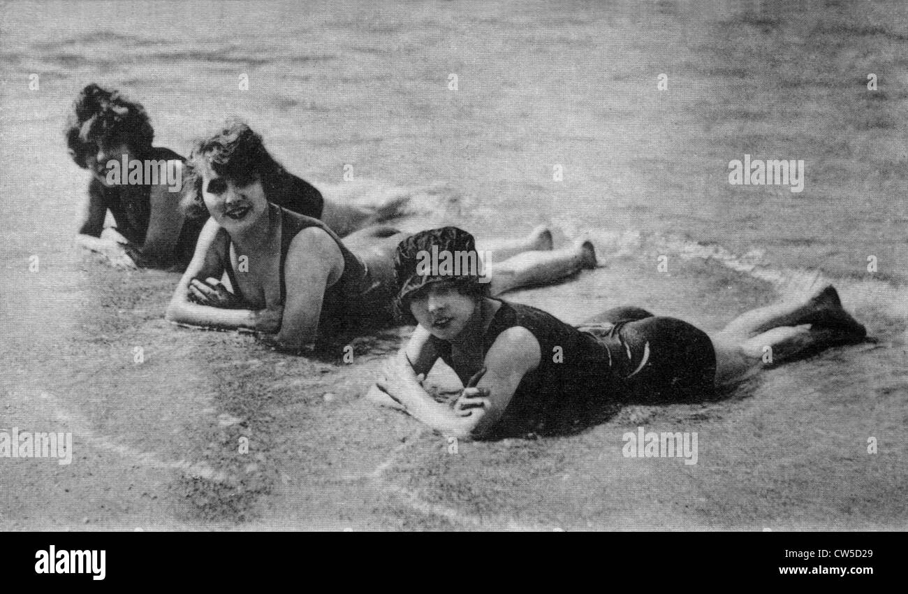 Charming bathers on the beach, postcard Stock Photo Alamy