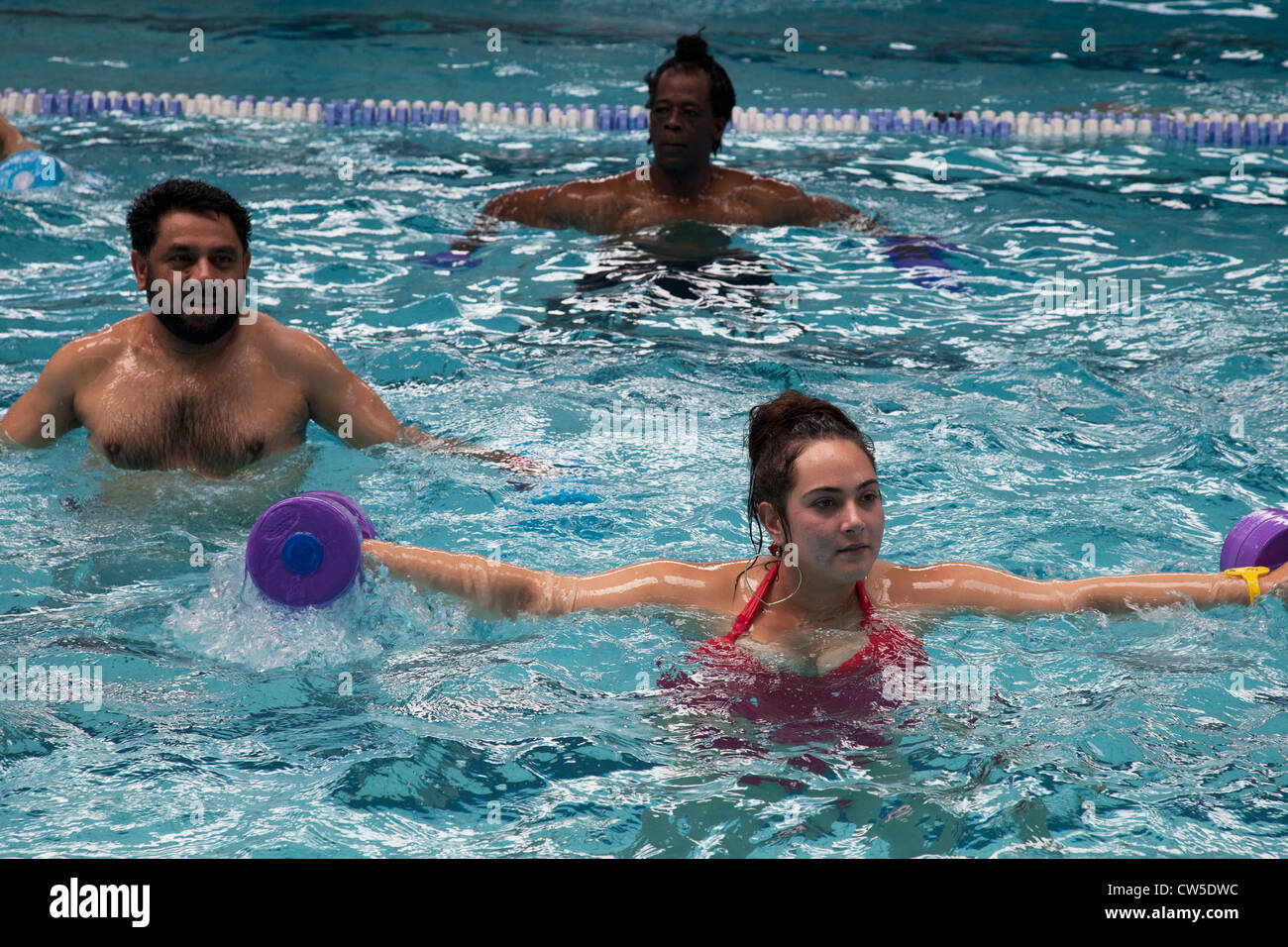Exercise class at Cally Pool swimming pool, London. People join the class for reasons including weight loss and general fitness. Stock Photo