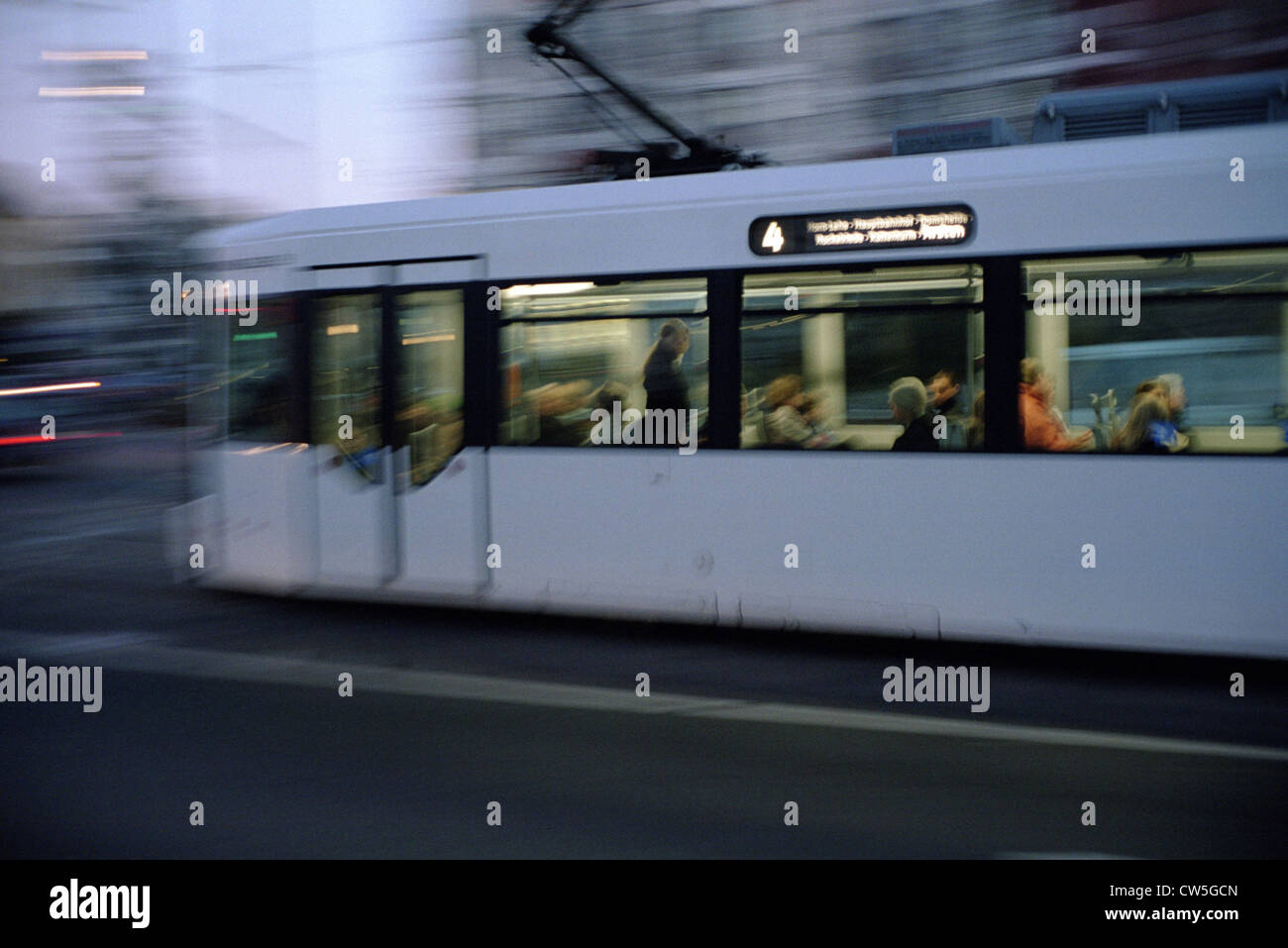 A tram in the dusk in Bremen Stock Photo