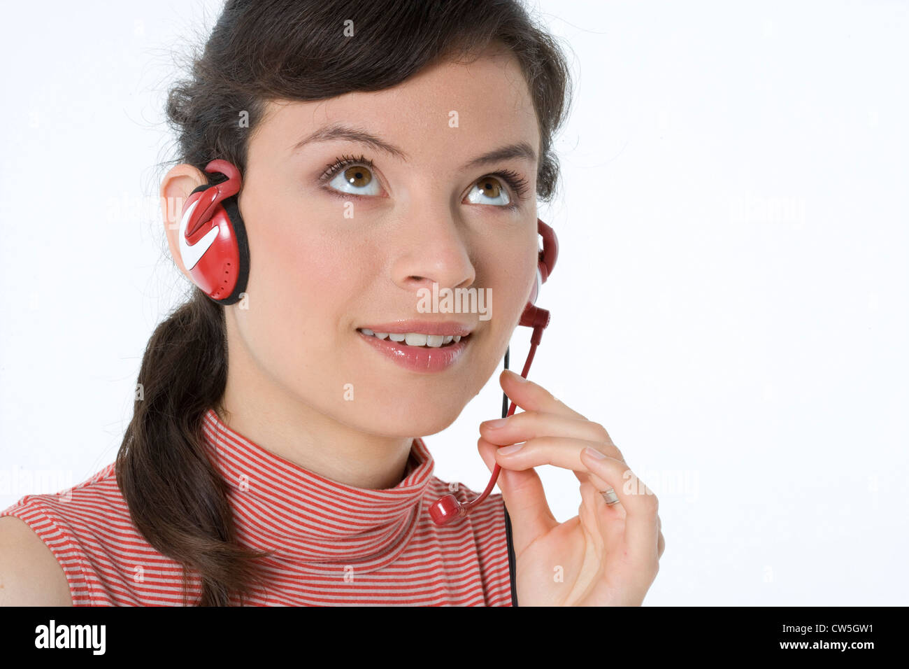 Close-up of a female customer service representative wearing a headset ...
