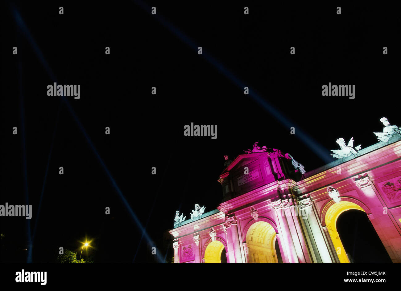 High section view of a building lit up at night, Puerta de Alcala, Madrid, Spain Stock Photo
