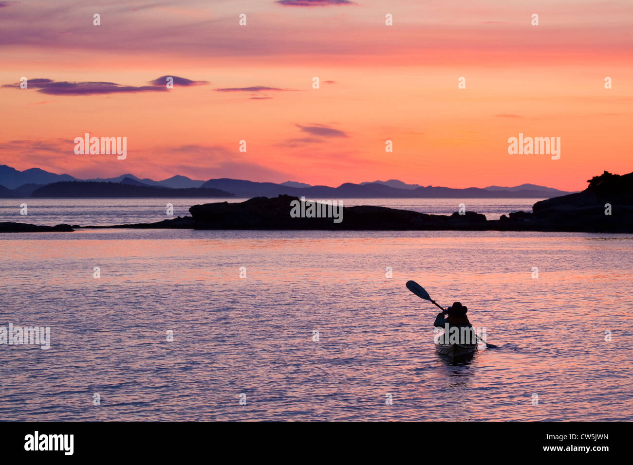 Kayakers at Sunset San Juan Island, Washington, USA Stock Photo