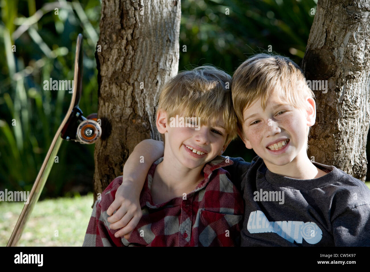 Portrait of two boys smiling Stock Photo - Alamy