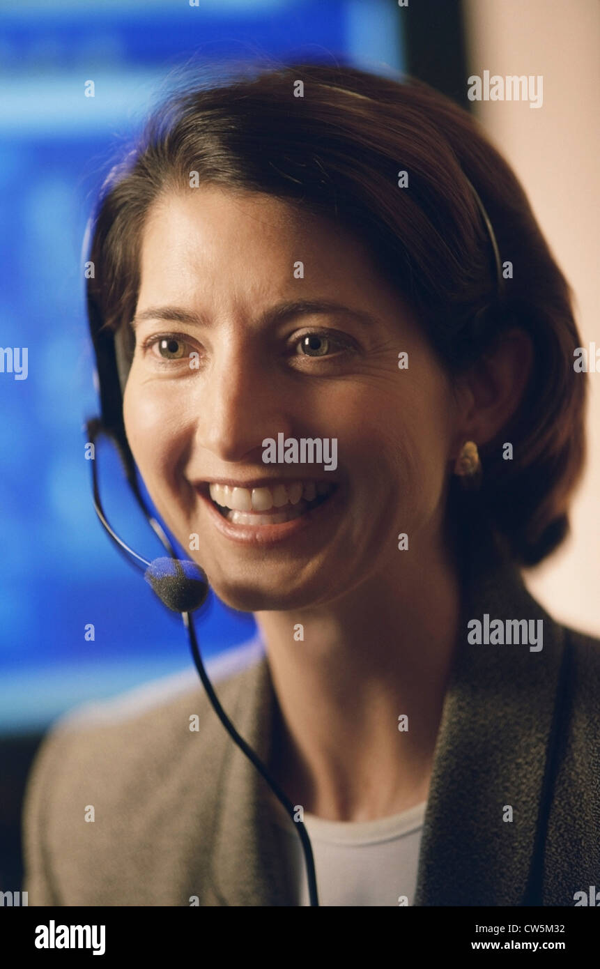 Close-up of a female customer service representative smiling Stock ...