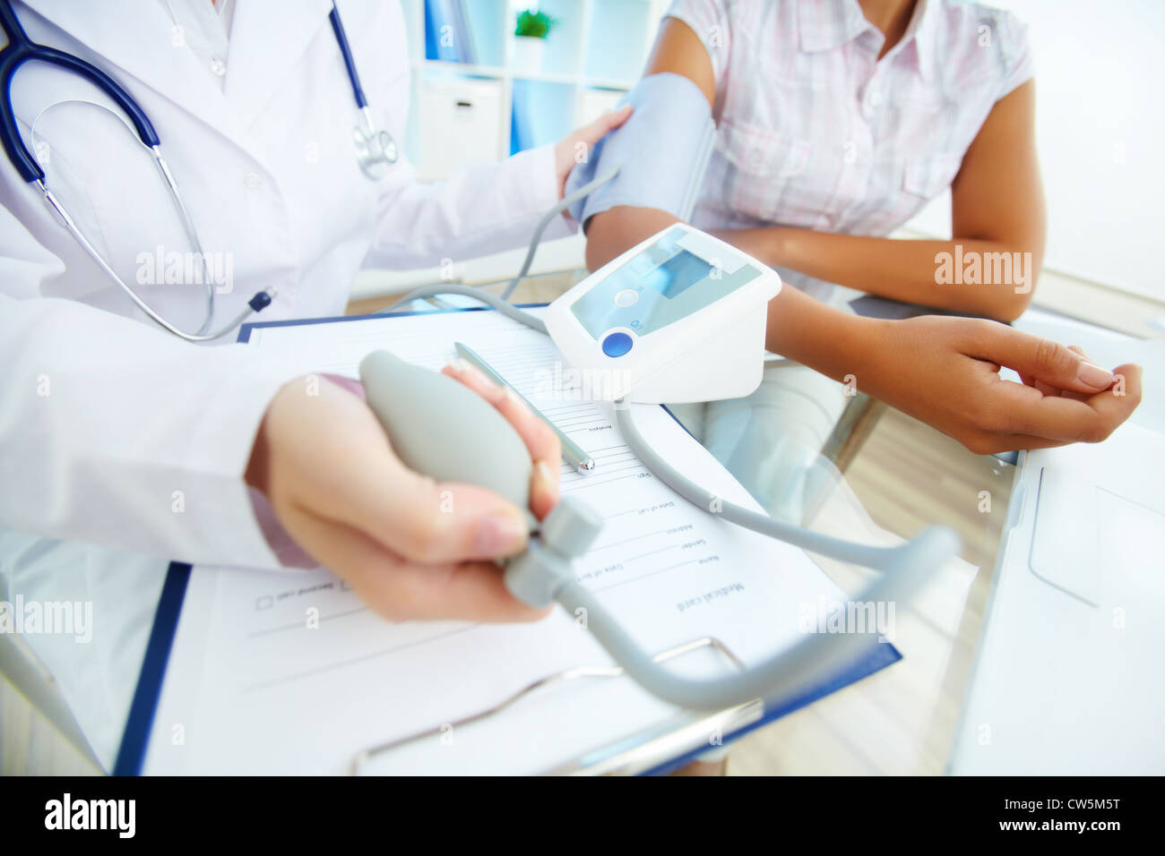 Female arm tonometer measuring hi-res stock photography and images - Alamy