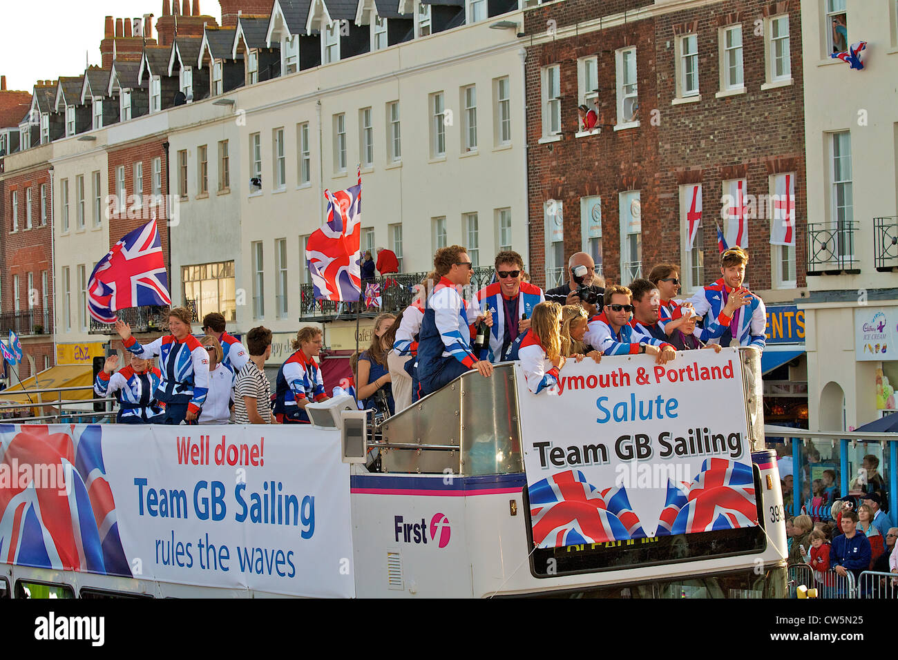 Team GB Sailor's are welcomed by crowds of over 100,000 on Weymouth Seafront at Weymouth Carnival 15 August 2012 Stock Photo