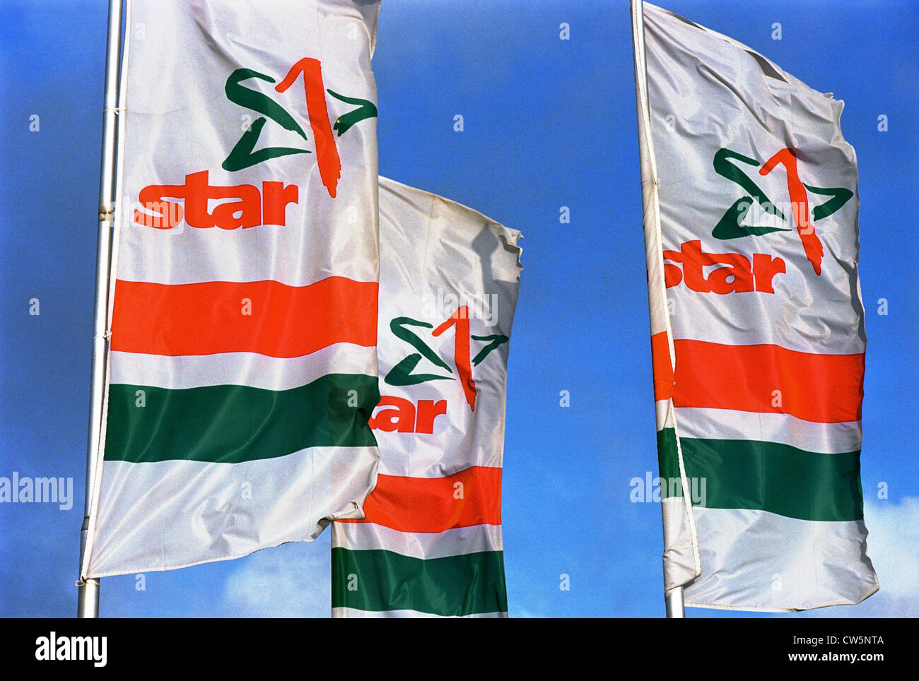 Flags chain of petrol stations Star Stock Photo