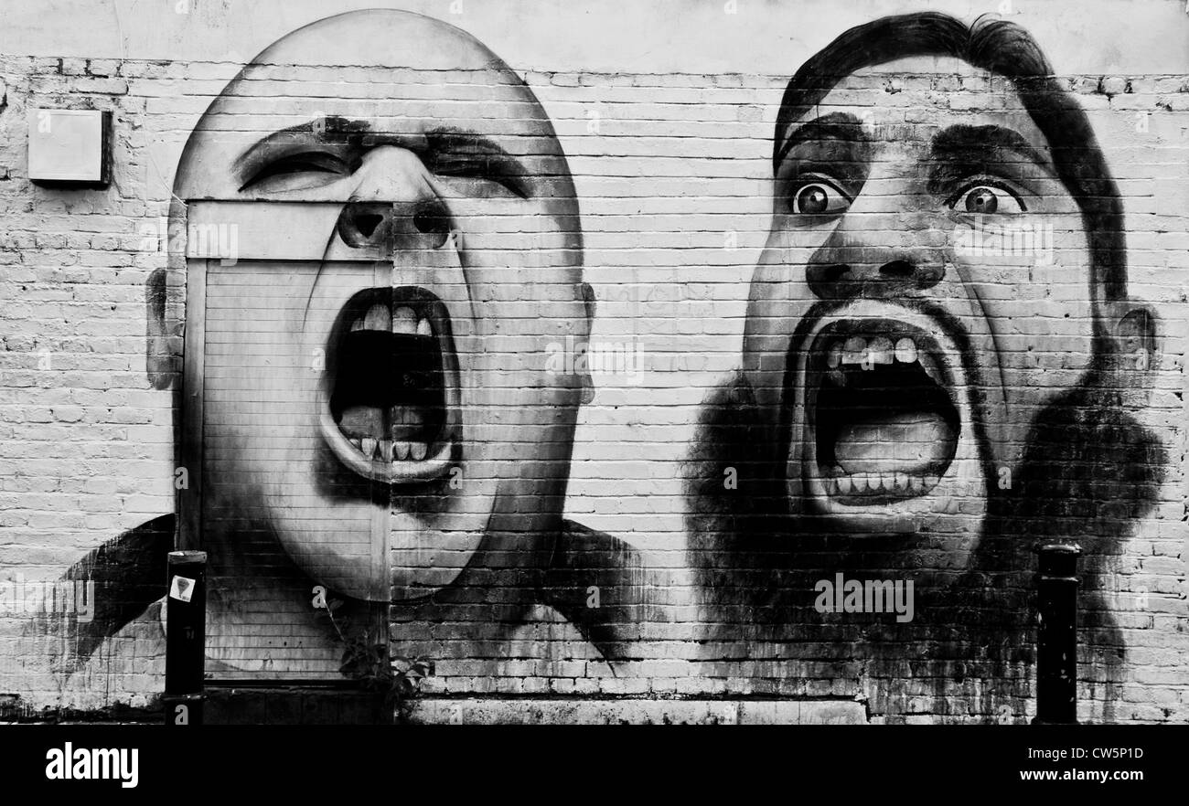 Street art of two men one English Defence League the other an Islamic extremist by Ben Slow Hanbury Street east London England Stock Photo