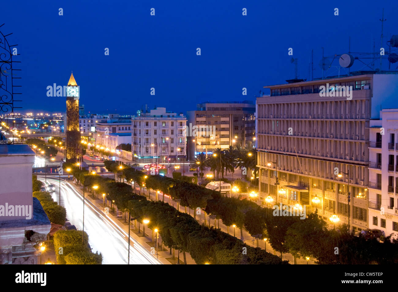 Clock Tower avenue Habib Bourguiba Ville Nouvelle Tunis Tunisia Africa with car night light streaks Stock Photo