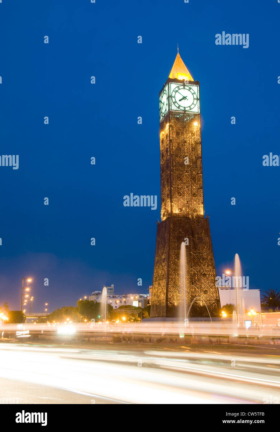 Clock Tower avenue Habib Bourguiba Ville Nouvelle Tunis Tunisia Africa with car night light streaks Stock Photo