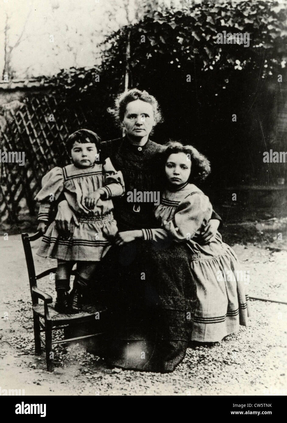 Marie Curie with her daughters Irene and Eve shortly after the death of Pierre Curie Stock Photo