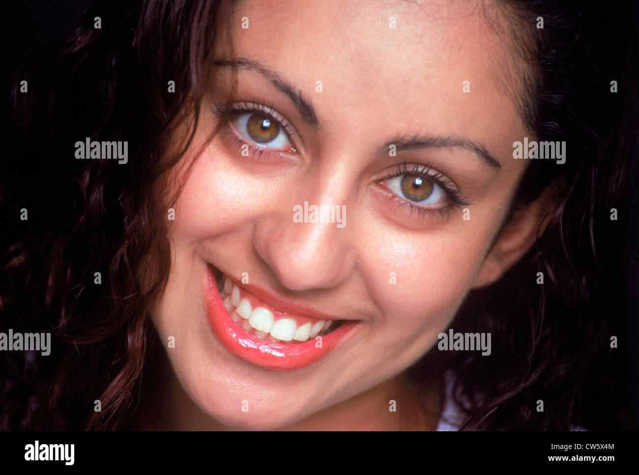 Woman with beautiful smile, teeth, eyes and complexion Stock Photo