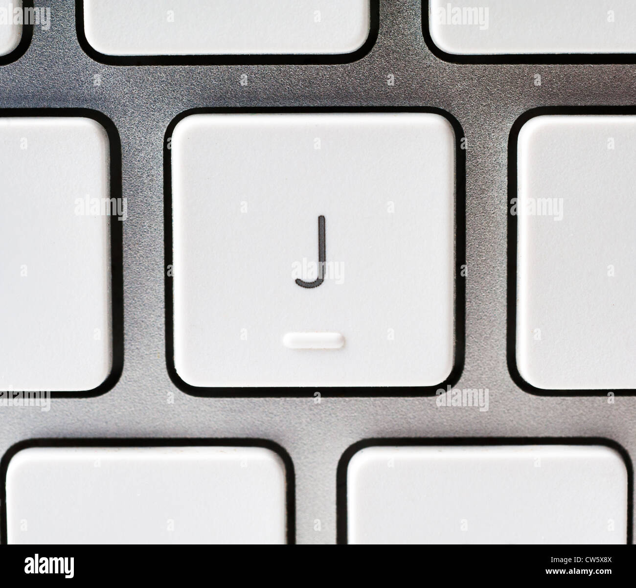 Letter J on an Apple keyboard Stock Photo