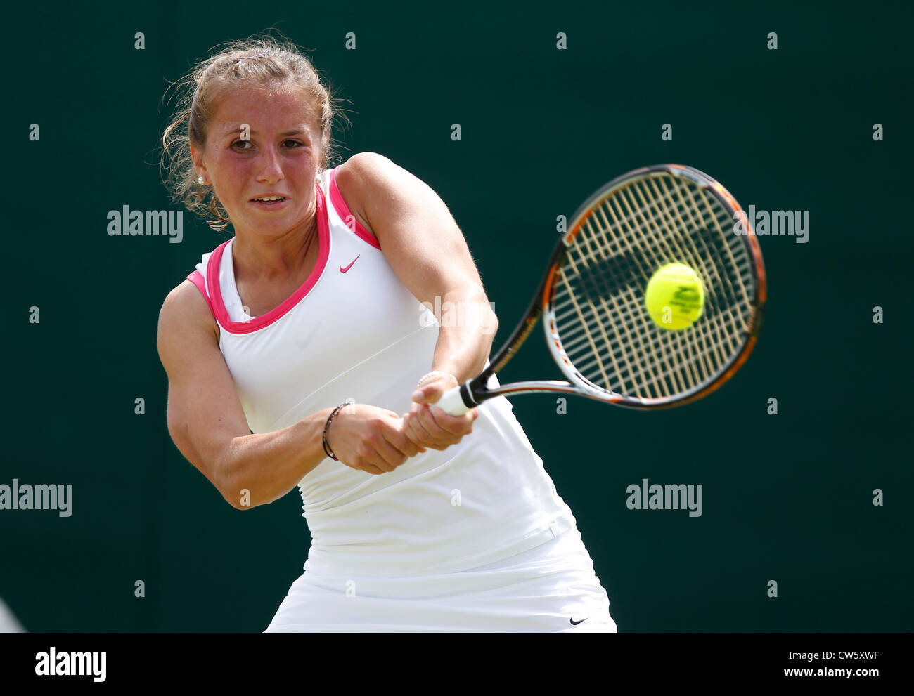 Annika Beck (GER) in action at Wimbledon Stock Photo - Alamy