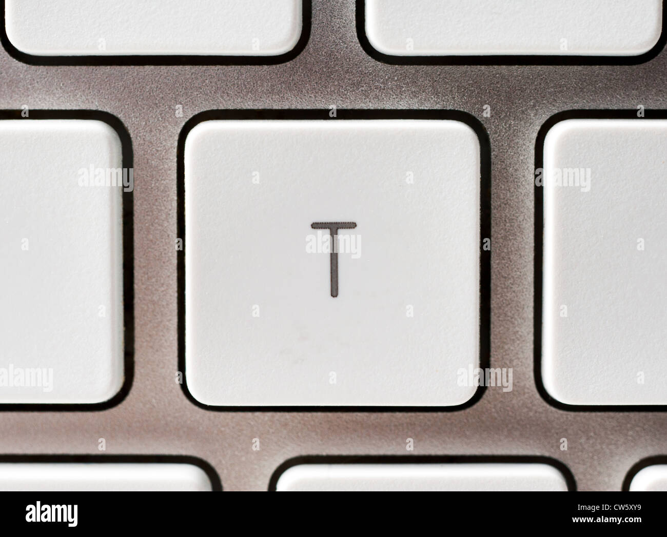 Letter T on an Apple keyboard Stock Photo