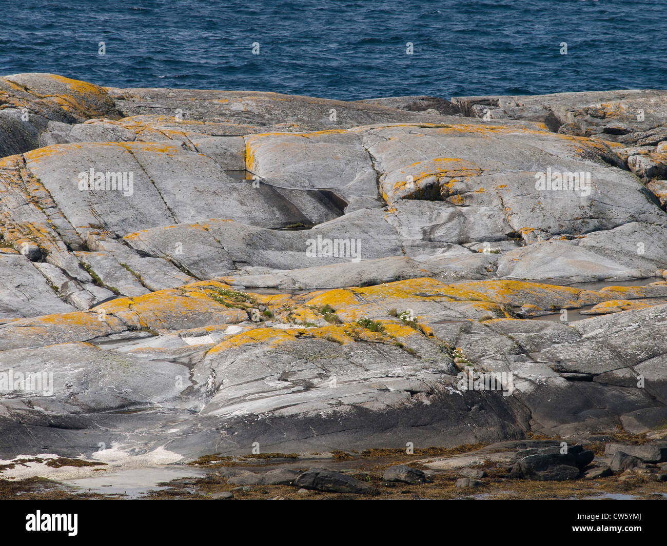 Rocks on the coast line of the North Sea near Stavanger Norway rounded by the ice-age and the sea Stock Photo