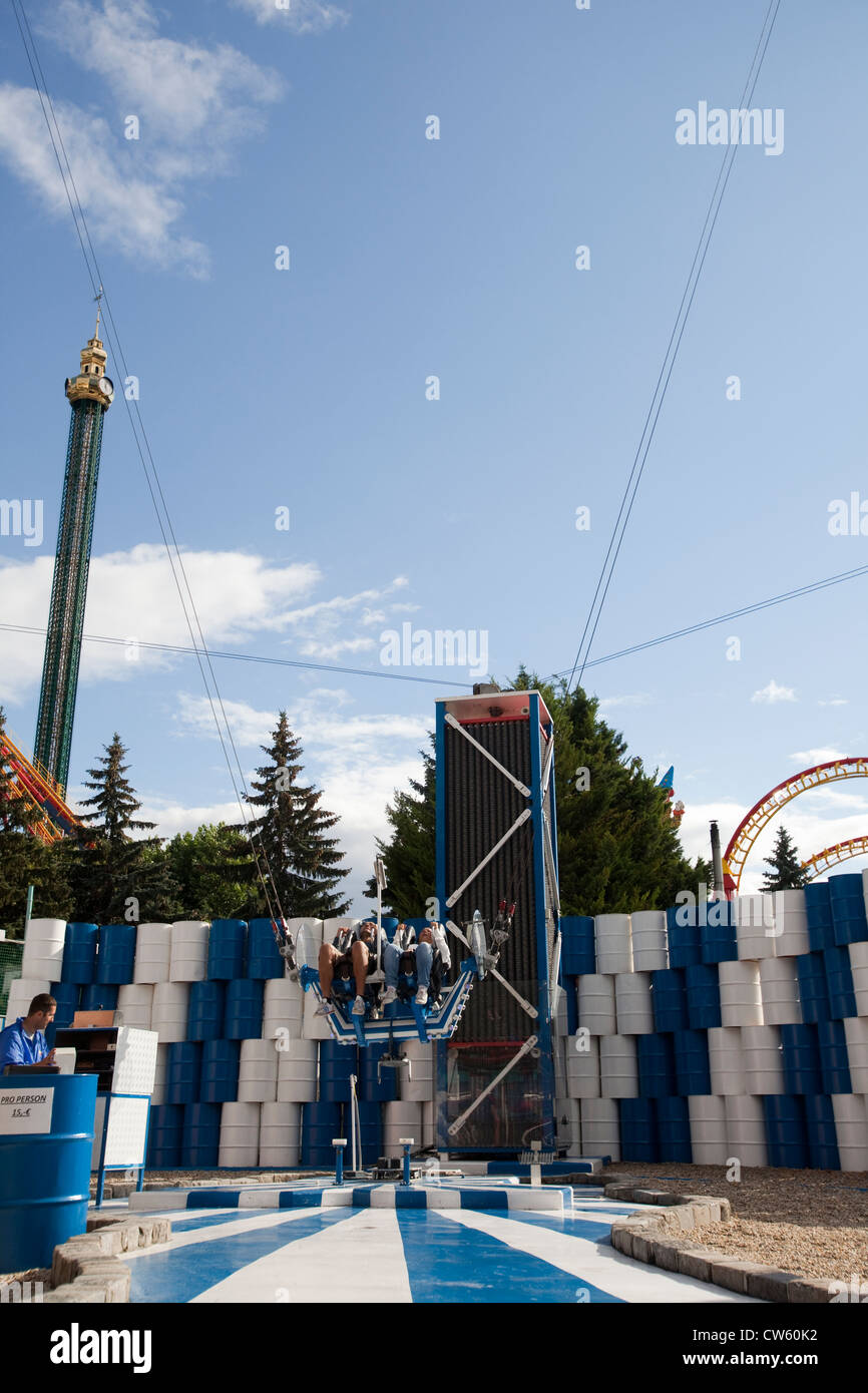 Two people in a catapult in the Prater amusement park in Viena Stock ...