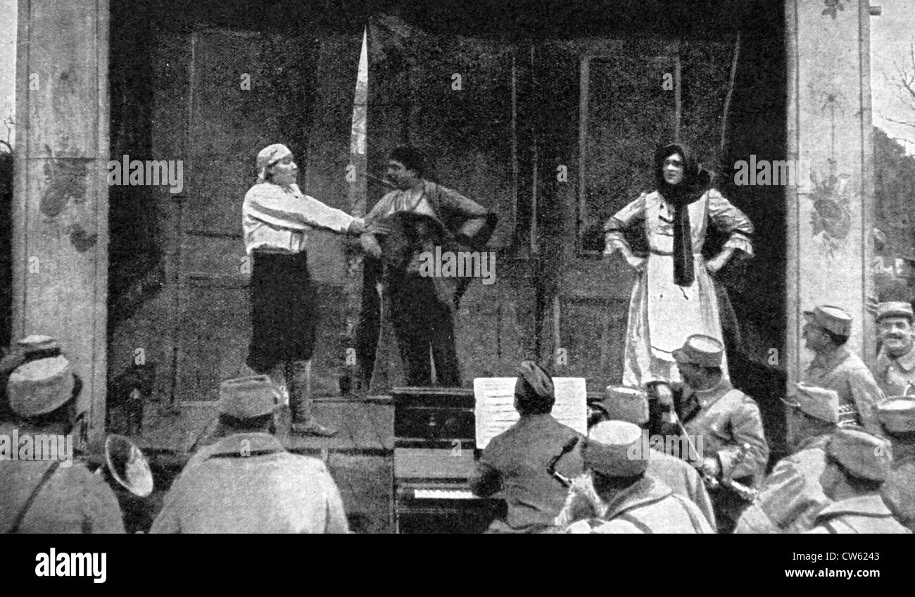 World War I.  Soldiers attending an open-air theatre play, in 'Le pays de France', 4-20-1916 Stock Photo