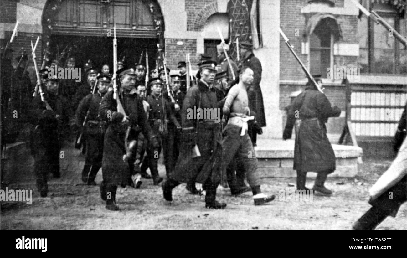 After the Peking riots, Chinese coolies about to be beheaded, February 1912. Stock Photo