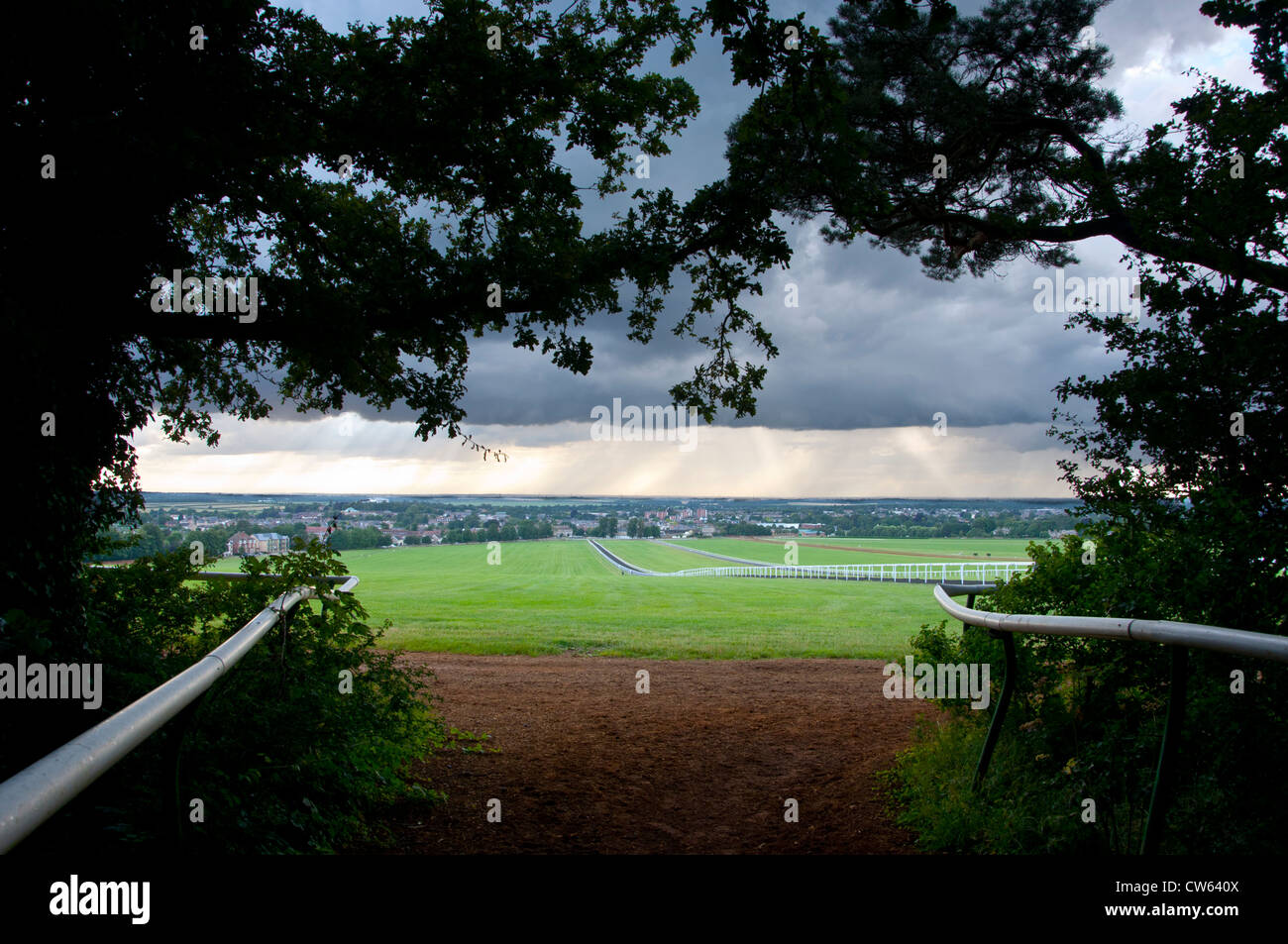 Storm clouds over Newmarket gallops Stock Photo