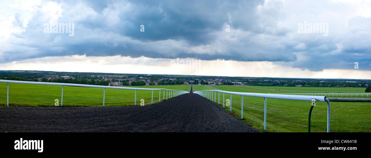 Storm clouds over Newmarket gallops Stock Photo