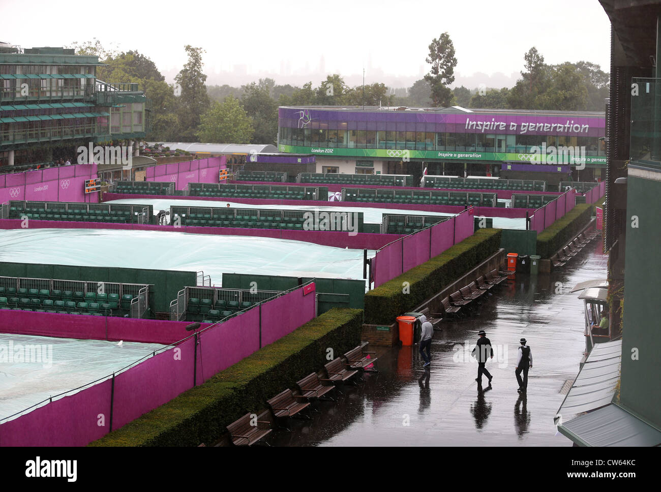 Venue from above of Olympic tennis tournament at Wimbledon during a rainy period,London 2012. Stock Photo