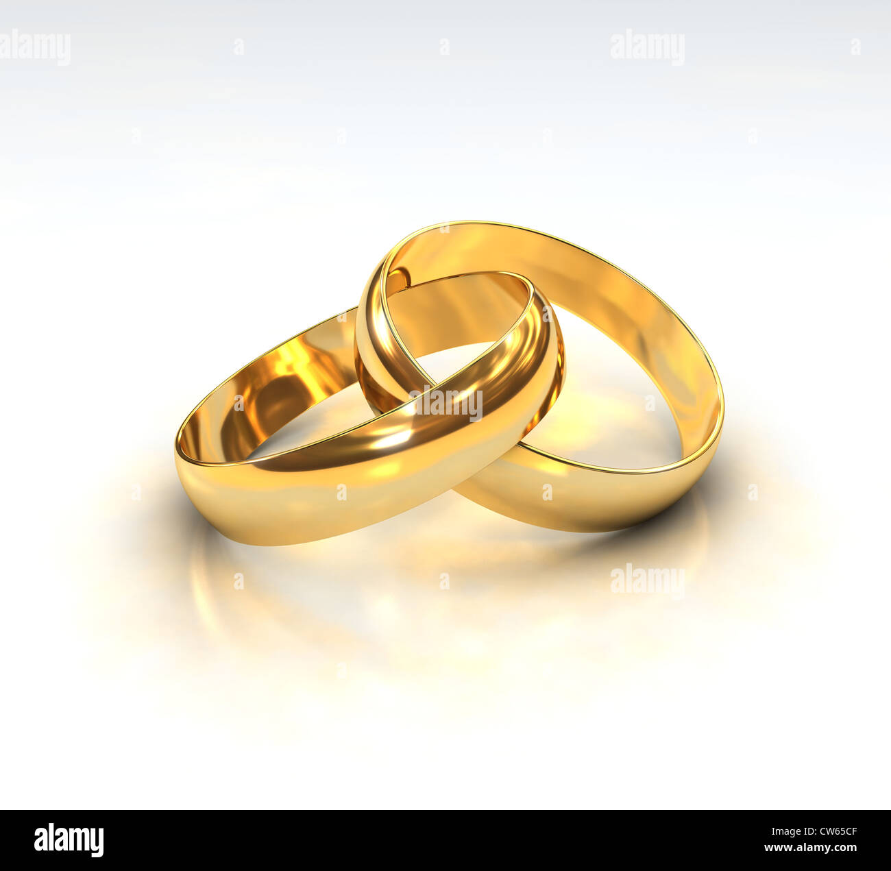 A Pair of golden Wedding Rings on white background Stock Photo - Alamy