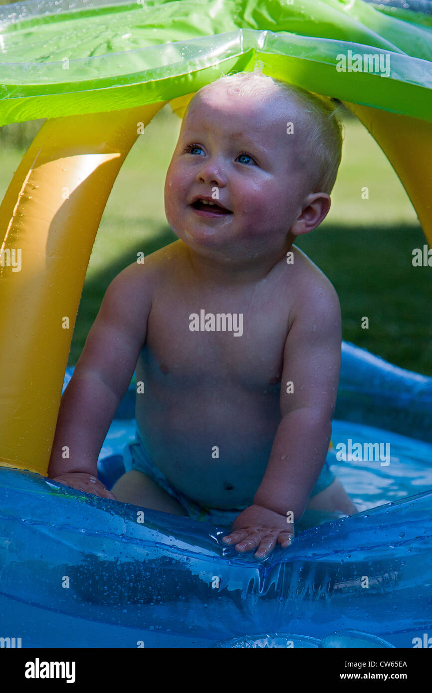 Baby in Paddling Pool Stock Photo Alamy