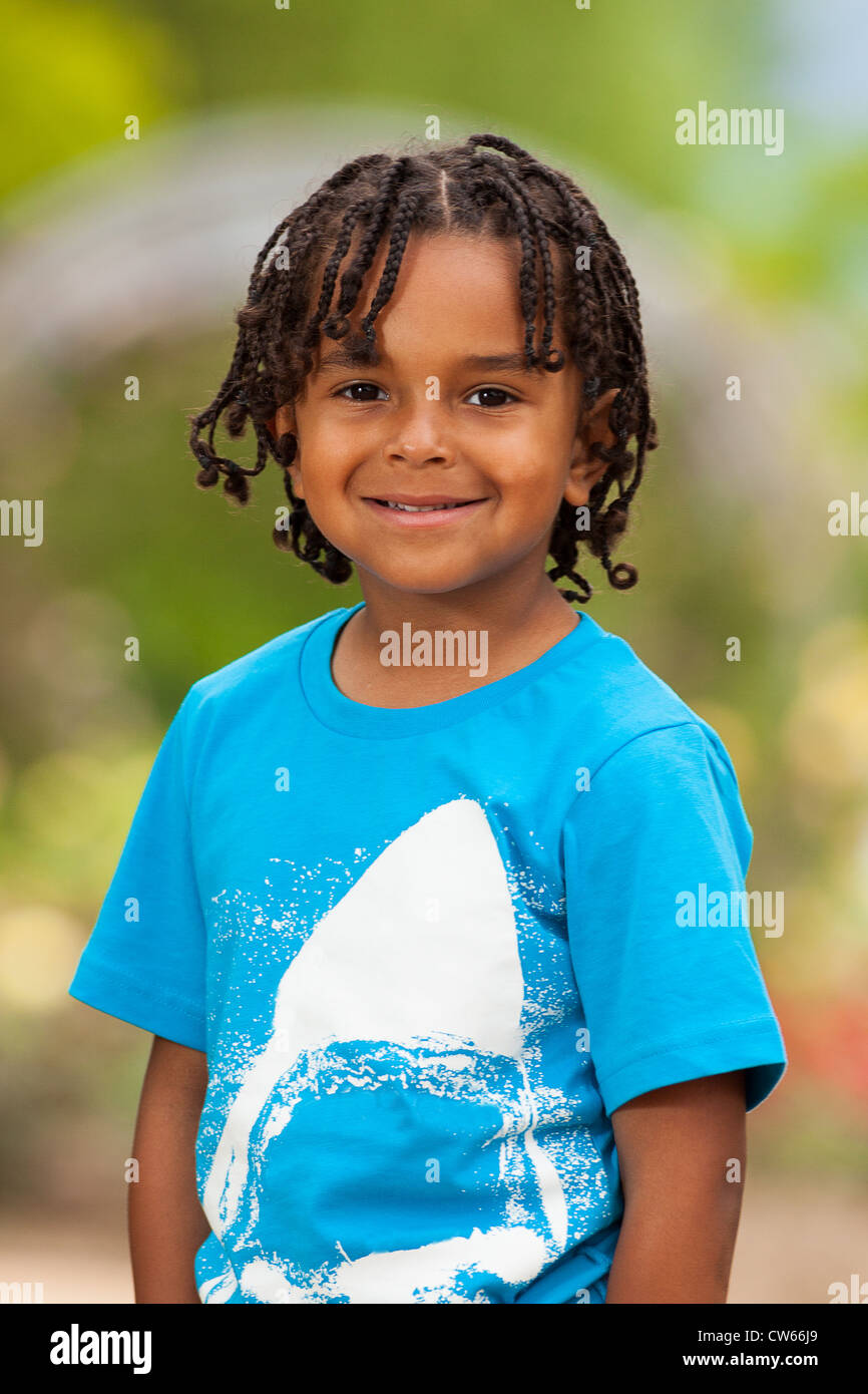 Outdoor Portrait Of A Cute African American Little Boy Stock