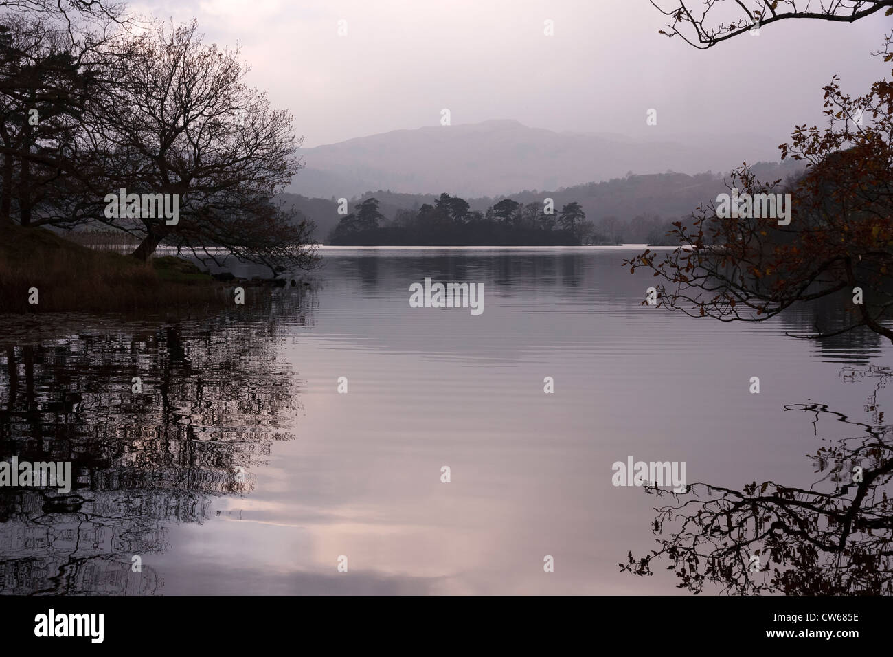 Rydal Water on a calm, grey misty Autumn day, Rydal, Lake District, Cumbria, England, UK Stock Photo