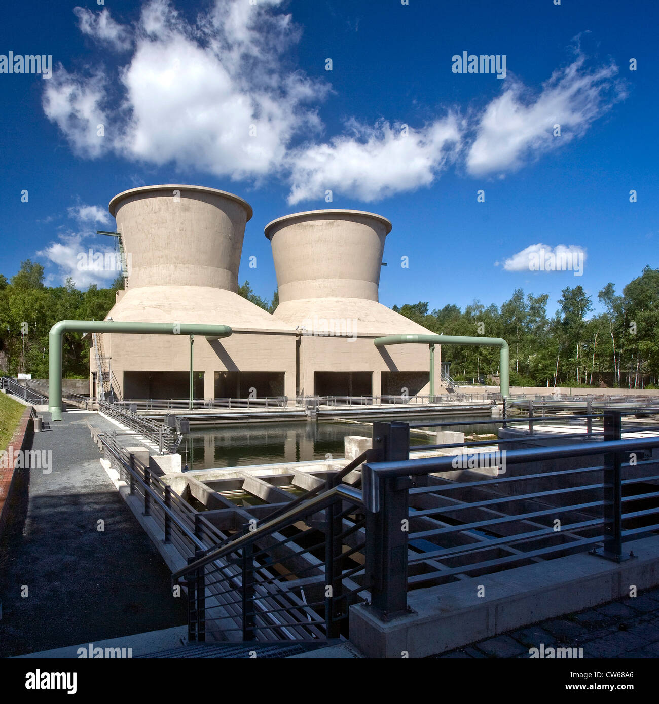 'World of Water' with cooling towers beside the Jahrhunderthalle in the the West Park Bochum, Germany, North Rhine-Westphalia, Ruhr Area, Bochum Stock Photo