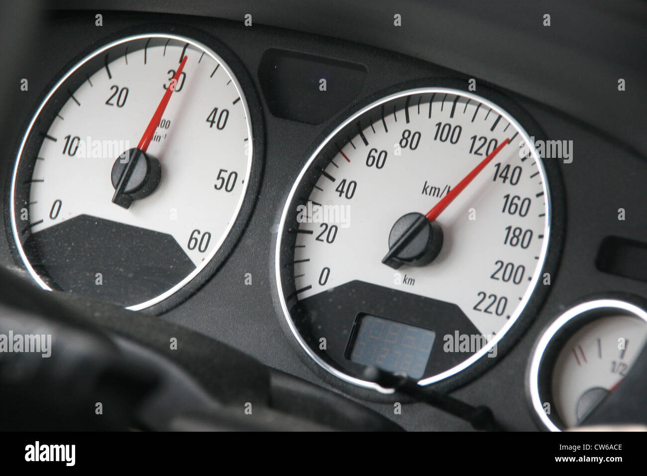 Speedometer in a car with speed 130 Stock Photo Alamy