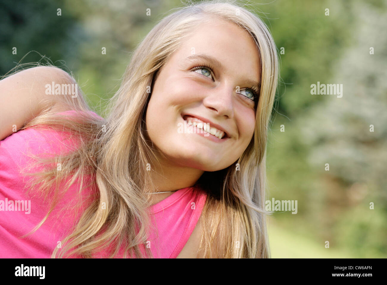 young blond smiling girl Stock Photo