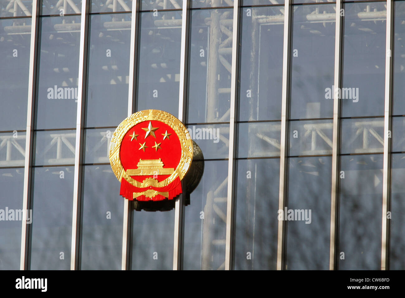 Beijing, the Chinese national emblem on a glass facade Stock Photo
