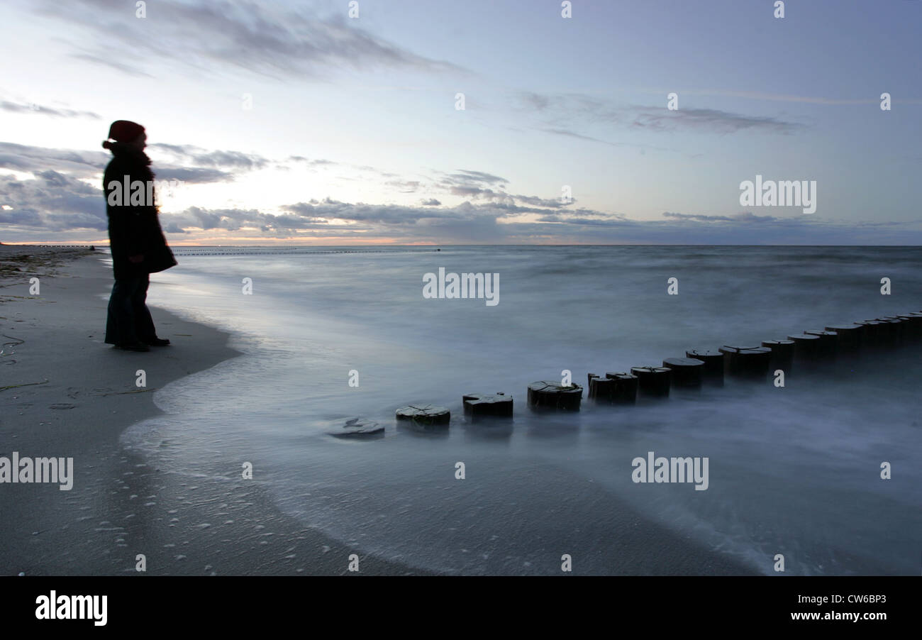 Zingst woman on the beach overlooking the Baltic Sea Stock Photo
