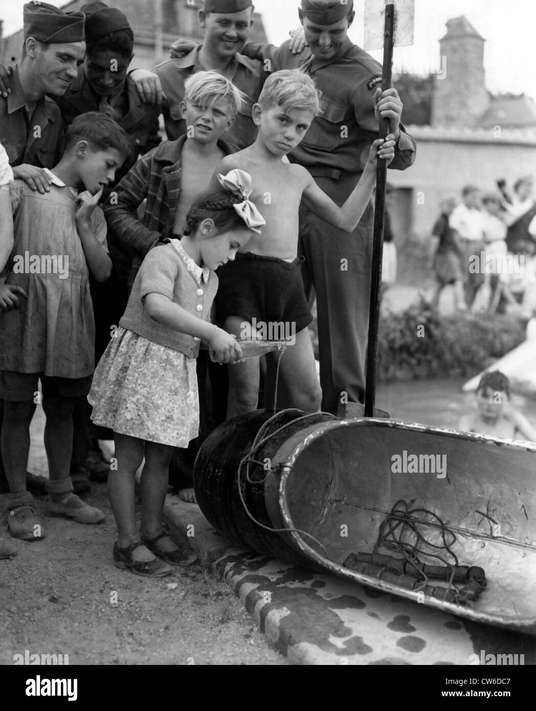 A little French girl christens a "boat" near Reims (France) August 7 ...